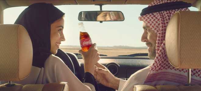 Coca-Cola&#x20;advert,&#x20;Saudi&#x20;Arabia,&#x20;Middle&#x20;East,&#x20;Change&#x20;has&#x20;a&#x20;taste