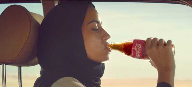 Coca-Cola&#x20;advert,&#x20;Saudi&#x20;Arabia,&#x20;Middle&#x20;East,&#x20;Change&#x20;has&#x20;a&#x20;taste