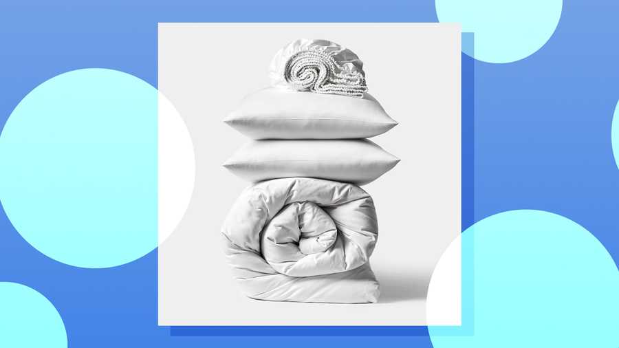 stack of sheets comforter and pillows