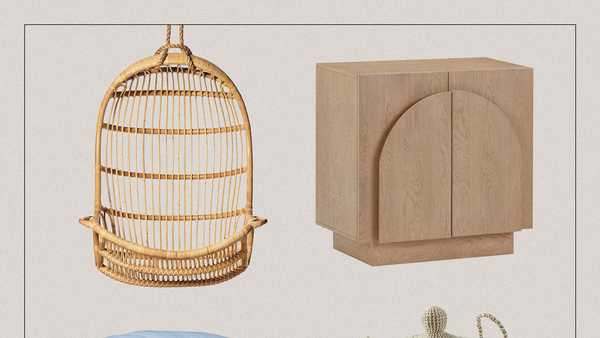 home decor items including a hanging chair a wooden cabinet a blue comforter and a woven storage basket