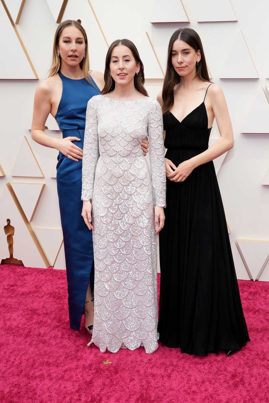 Danielle Haim, Este Haim, and Alana Haim attend the 94th Annual Academy Awards at Hollywood and Highland on March 27, 2022 in Hollywood, California. Danielle Haim, Este Haim, and Alana Haim attend the 94th Annual Academy Awards at Hollywood and Highland on March 27, 2022 in Hollywood, California.