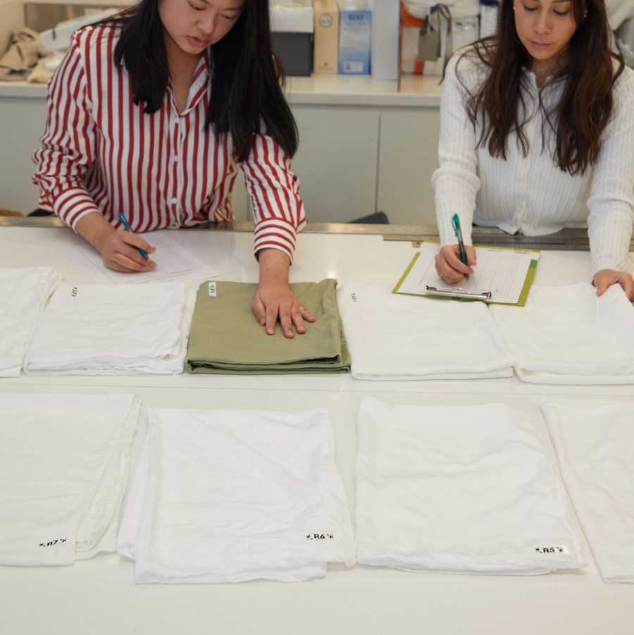 sheets softness testing two consumer testers touching and rating softness of sheets