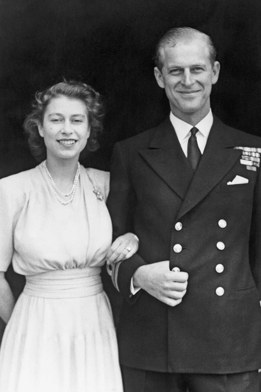 Photograph, Standing, Gesture, Formal wear, Grandparent, Family, Suit, Vintage clothing, Uniform, Black-and-white, Photograph, Standing, Gesture, Formal wear, Grandparent, Family, Suit, Vintage clothing, Uniform, Black-and-white,