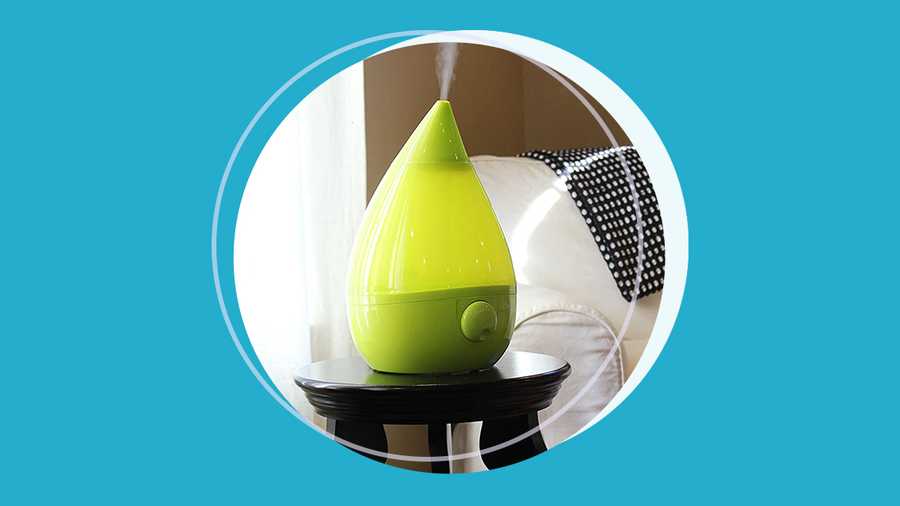 neon green portable humidifier on side table