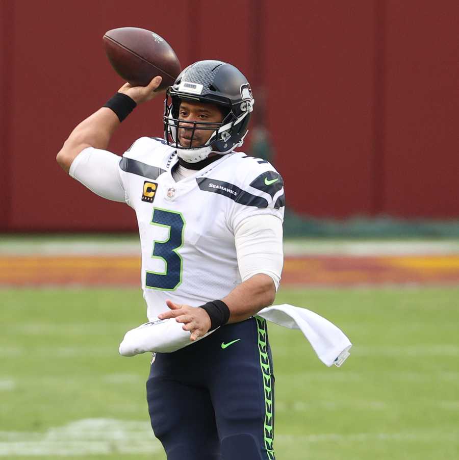 Why Do Football Players Wear Towels? Unveiling the Mystery