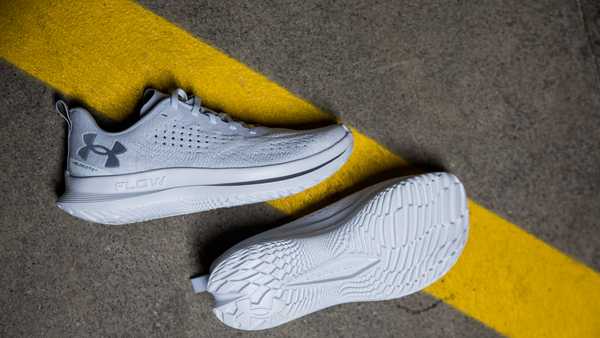 under armour velociti 4 shoes on a road surface