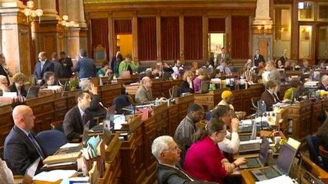 Iowa lawmakers are still at the Statehouse 10 days after they were supposed to have adjourned.