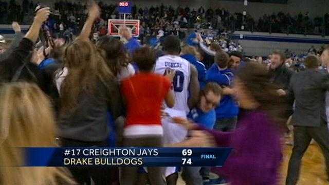 Drake University fans stormed the court after the men’s basketball team upset 17th ranked Creighton.