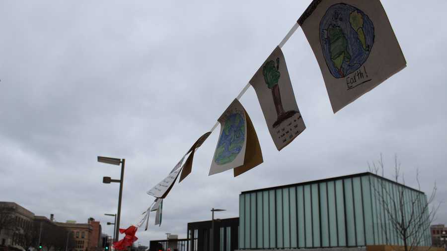 The Principal Riverwalk has been lined with 5,000 individual flags with environmental messages from students and volunteers.