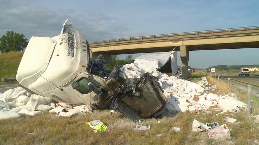 A semi broke into pieces after it slammed into an interstate bridge Friday.