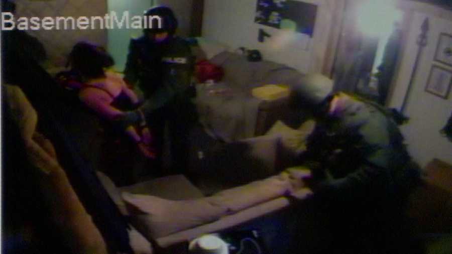 Freeze frame from the Prince family's basement surveillance camera