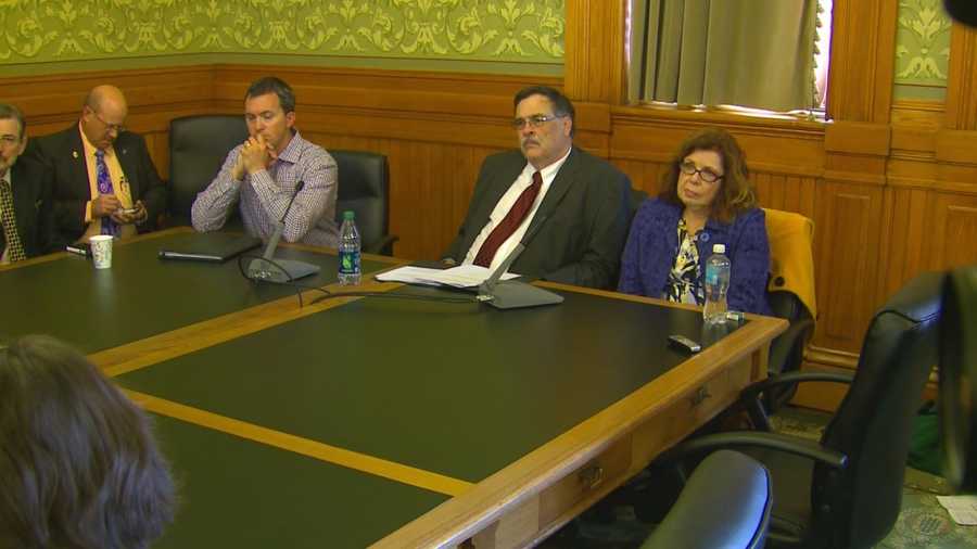 Former state employees who received settlements when leaving their jobs testified at a hearing at the state Capitol Wednesday.