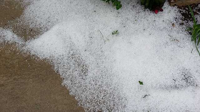 Hail covers ground in West Des Moines