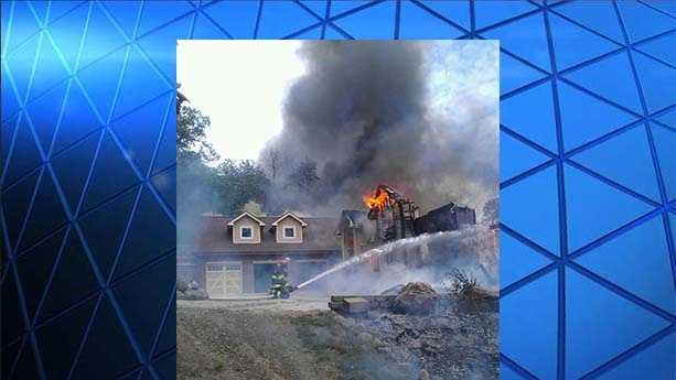 Fire engulfs and destroys home