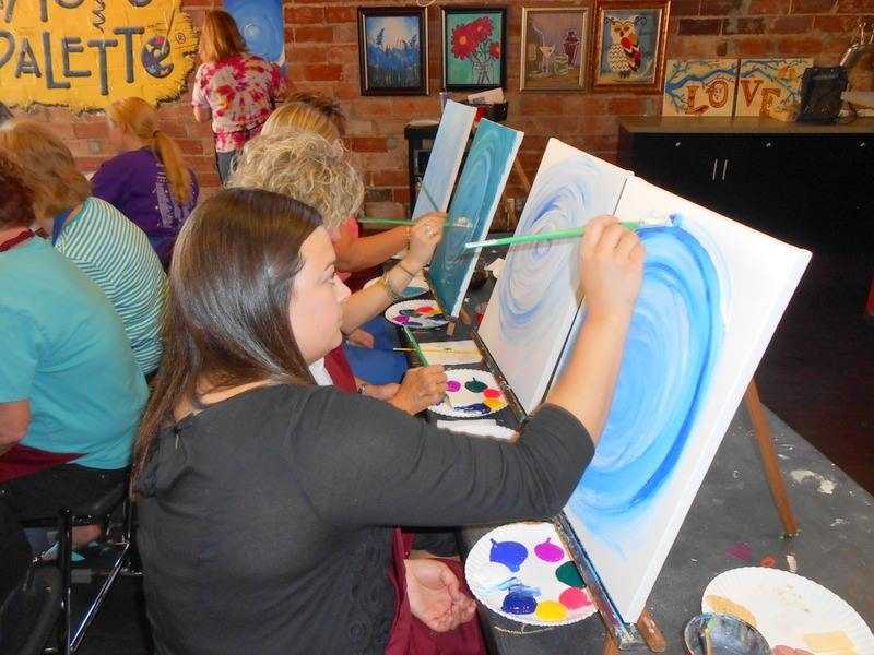 Photos Popular paint and sip studio drops into Des Moines