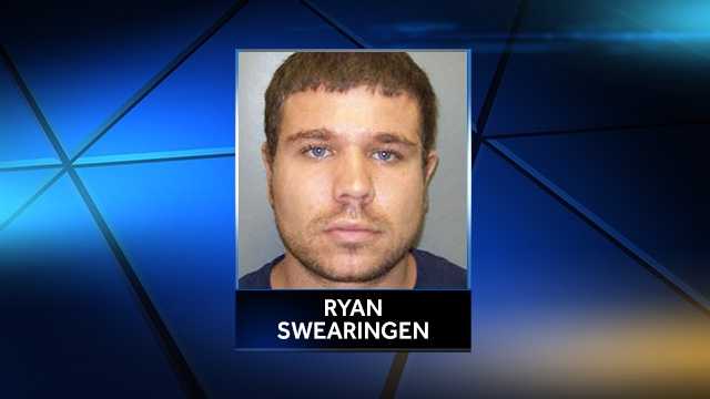 Ryan Swearingen, 27, was shot and killed by an officer Sunday after he waved a knife, according to police.