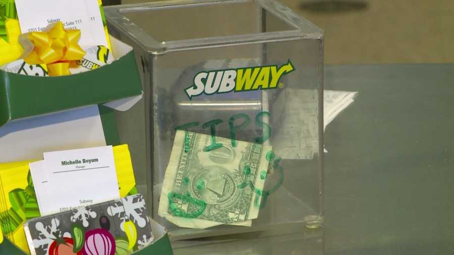 Employees at a local Subway sandwich shop selflessly turned their tips into meals and gifts for local families.