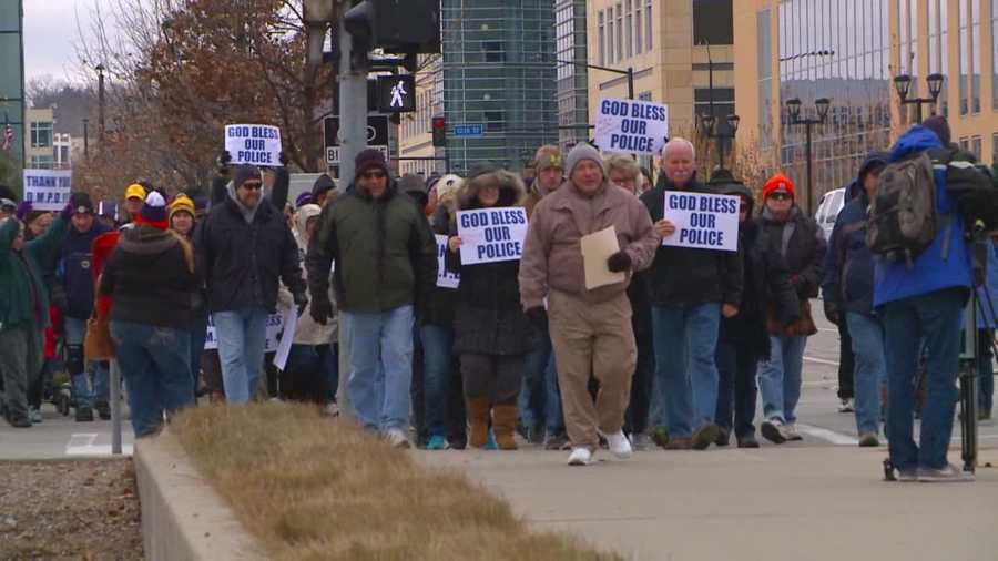 About 100 people participated in a walk to honor local law enforcement Saturday.