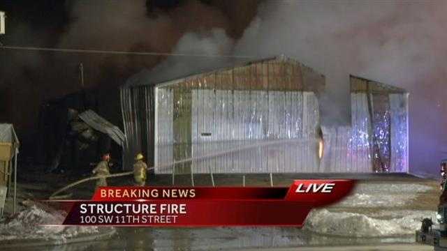 Building Closure Explosion Explosion causes building collapse as crews battle blaze