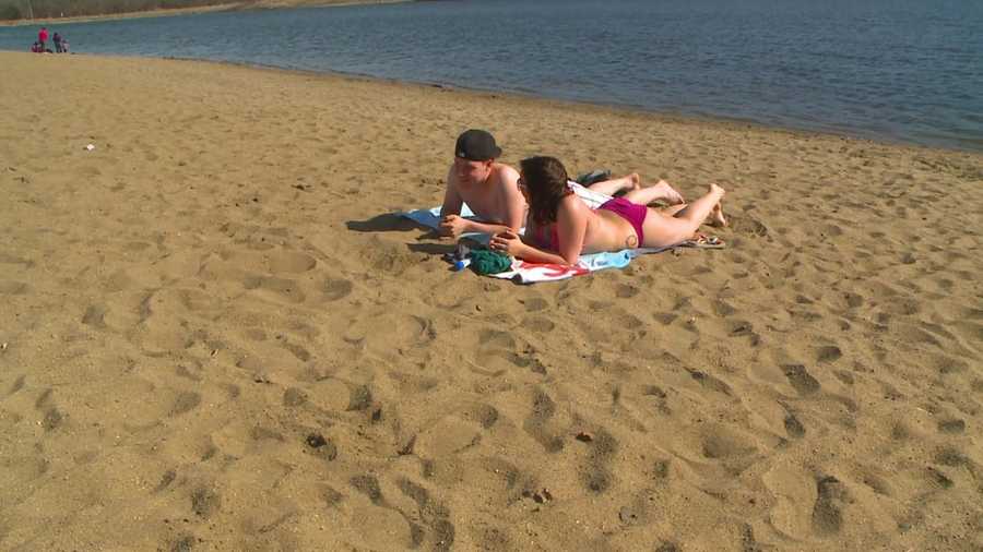 It's been a while since temps have hit 80 degrees in Iowa, which is why a few brave people shed their clothes and hit the beach at Grays Lake.