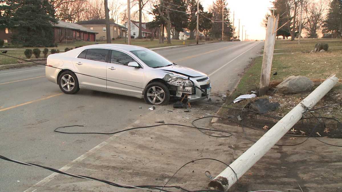 Police: Driver in stolen car knocks down power pole