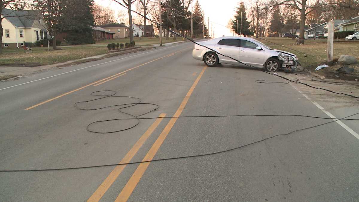 Police: Driver in stolen car knocks down power pole