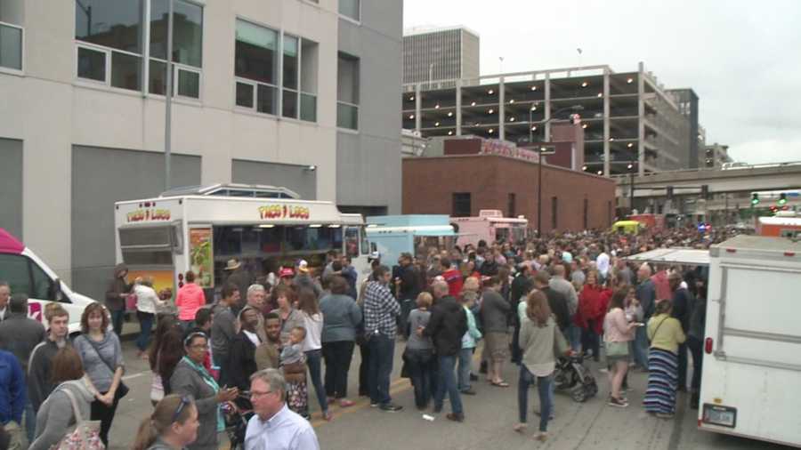 Organizers held the Beverage Food Truck Throw Down outside the Des Moines Social Club Saturday, where 12 food trucks lined the streets to feed thousands.
