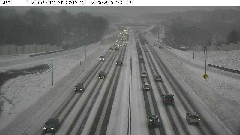 PHOTOS: Snowstorm hitting Iowa in two waves Monday