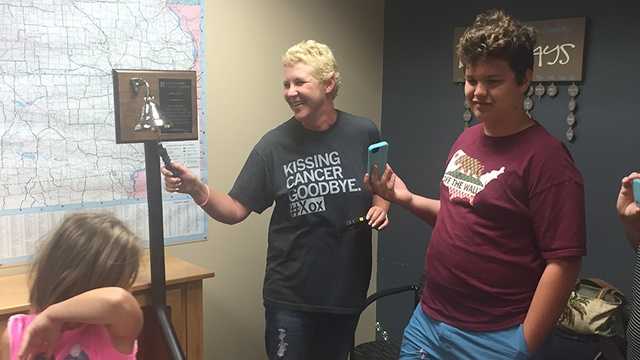 Joyce Ellen was the first patient at the John Stoddard Cancer Center to ring the end of treatment bell.