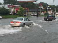 Flooding along Merle Hay Road just south of the mall.