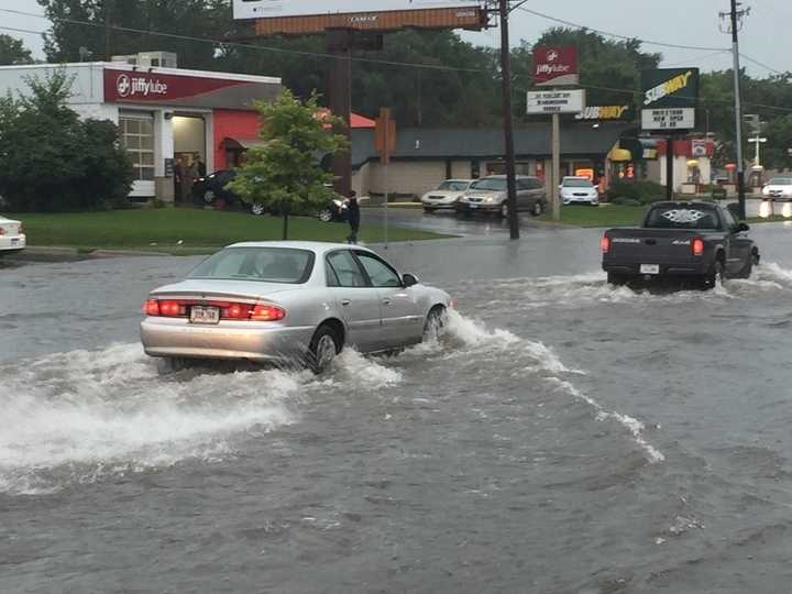 merle_hay_flooded 2.jpg Flooding along Merle Hay Road just south of the mall.