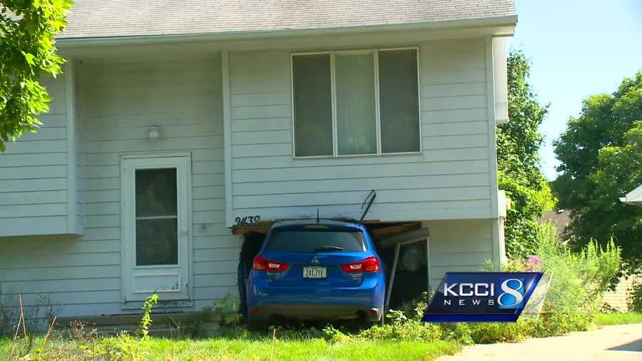 Neighbors were shocked when the driver of a blue SUV rammed into a house Tuesday night.
