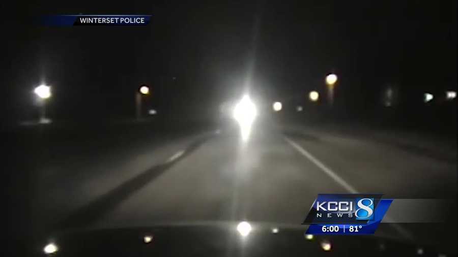 A Winterset police officer narrowly avoided a head-on collision with an intoxicated driver, and the incident was caught on camera.