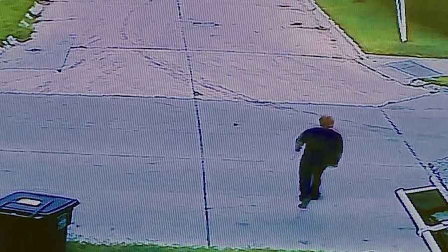 Security camera footage shows a man stealing a package from a Des Moines family's front porch.