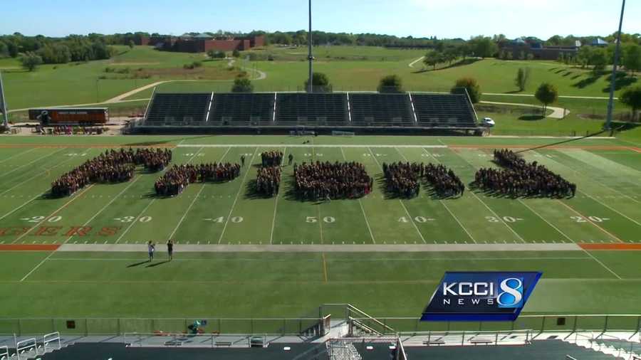 More than 1,300 students gathered to create the largest human formation of the word “friend.”