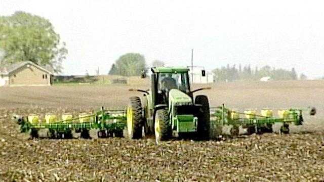 Farm tractor planting