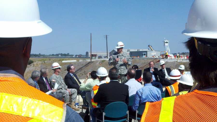 A ceremony is held at Folsom Lake Thursday, marking a construction milestone for the Folsom Dam flood-control project.