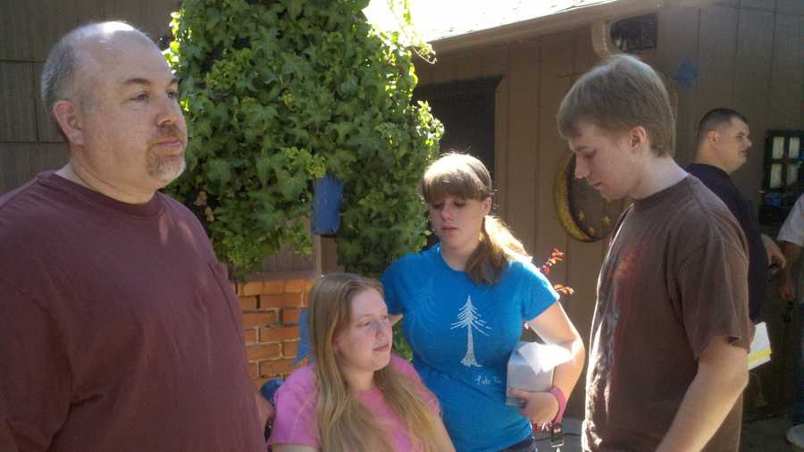 West, seated, is next to her her niece and nephew. Her older brother, Trevor West, stands in the forefront. Walden was suspected of drinking and driving when he was arrested last month, three days after the fatal hit-and-run crash. Authorities said by time they made the arrest, it was too late to determine whether he was driving under the influence in the crash that led to Long-Randall's death.