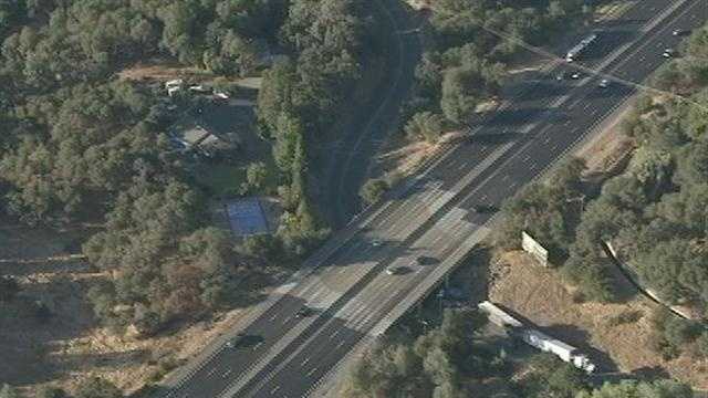 Photos: Big rig flips over near Interstate 80