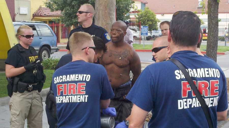 Police detain the suspect in the shooting and robbery of a naked teenager.