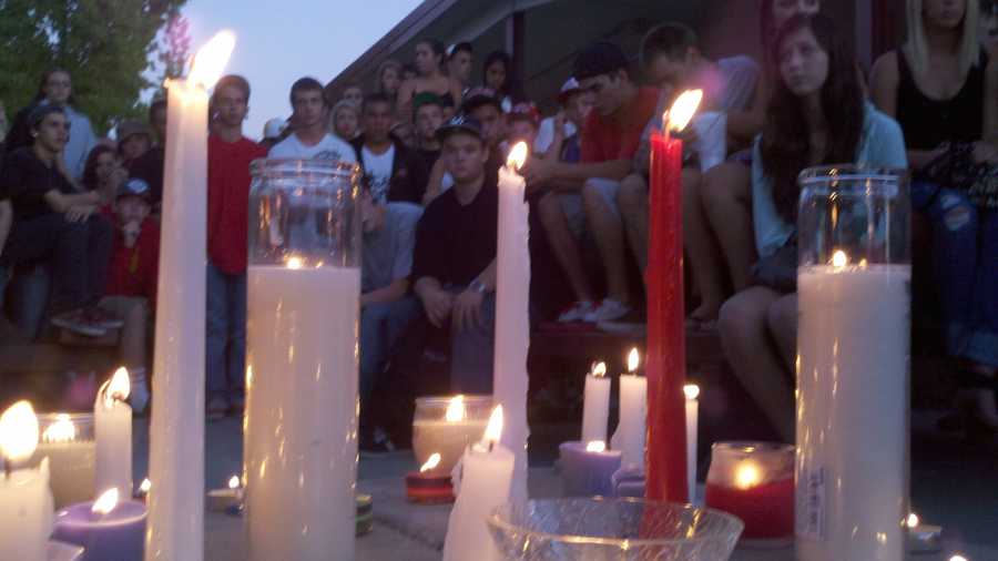 A candlelight vigil is held for the death of Alejandro Nunez Avila.