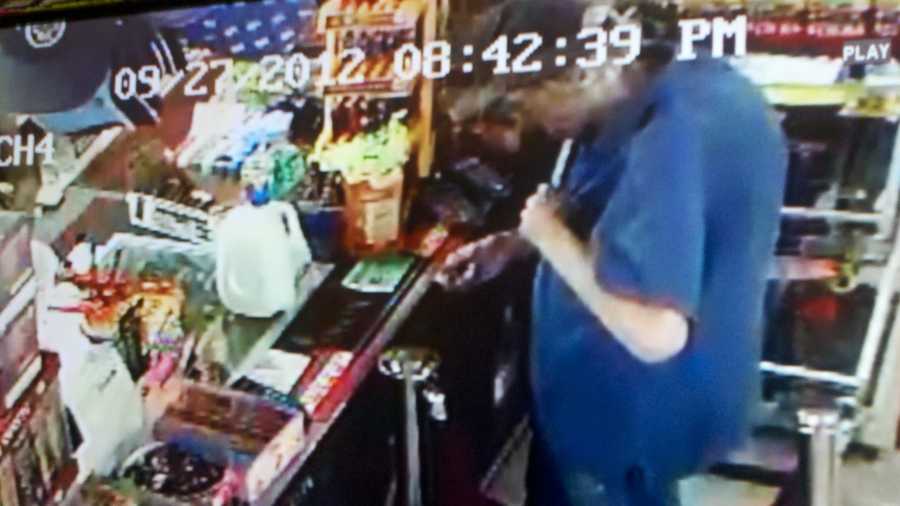 A surveillance camera captured this image of Philip Jensen buying milk minutes before he was hit and killed along Fulton avenue.