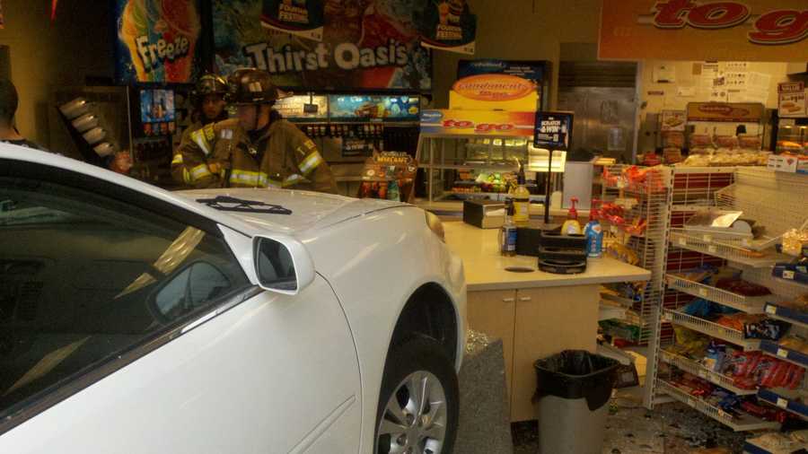 A woman crashed her car into a Sacramento AM/PM gas station on Thursday morning (Nov. 29, 2012).