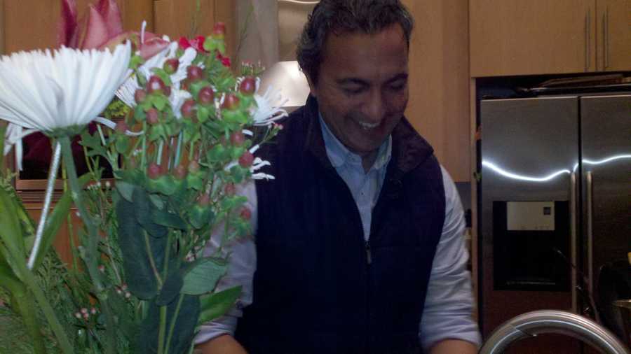 Ami Bera washes dishes at his home in Elk Grove (Dec. 18, 2012).