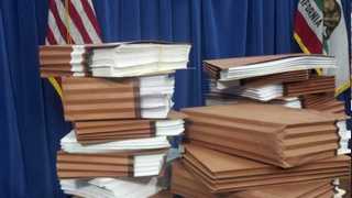 A pile of legal filings in the prison health care case. (Jan. 8, 2013)