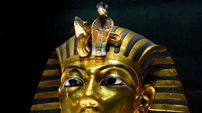 King Tut was buried in 1358 B.C. with his treasures, including hundreds of gold figurines
