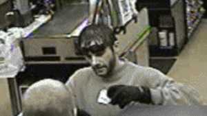 The Roseville Police Department released surveillance photos of the robber.