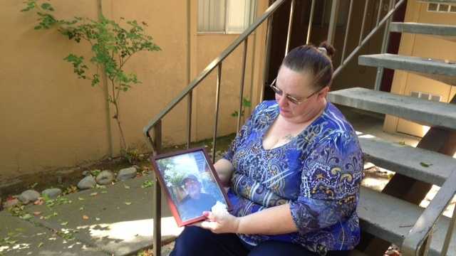 Debbie Jensen sitting outside her home (April 9, 2013)