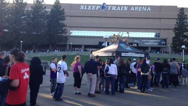 Fans walk up to Sleep Train Arena during the Kings final regular season game earlier this month.