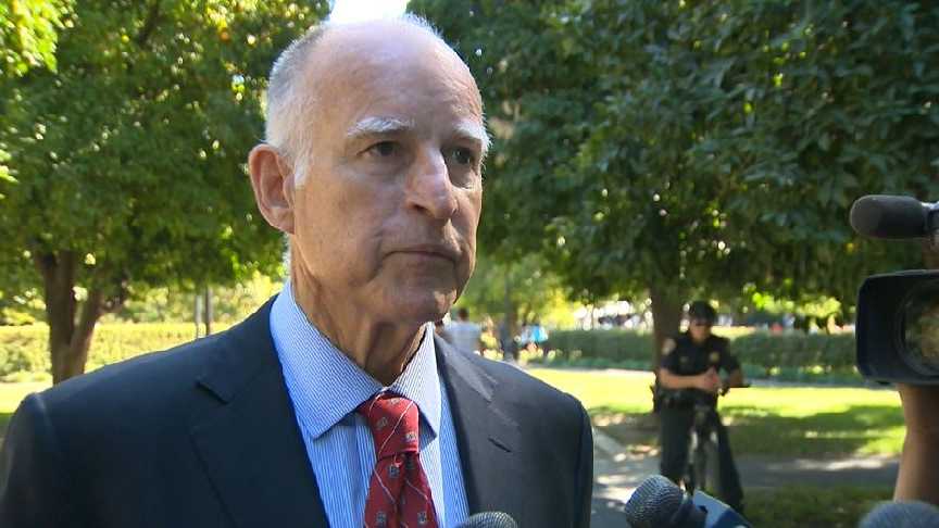 Gov. Jerry Brown speaks with reporters. (Oct 5, 2013)